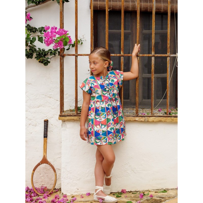 Vestido estampado niña con adornos de lazo en el pecho  Colección primavera-verano 2025 de la marca española José Varón