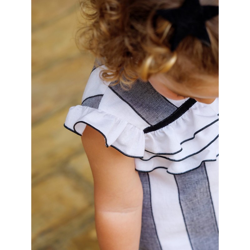 Vestido rayas negras y blancas bebe con detalle volante 2p  Colección primavera-verano 2025 de la marca española José Varón