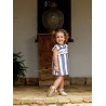 Vestido rayas negras y blancas bebe con detalle volante 2p  Colección primavera-verano 2025 de la marca española José Varón