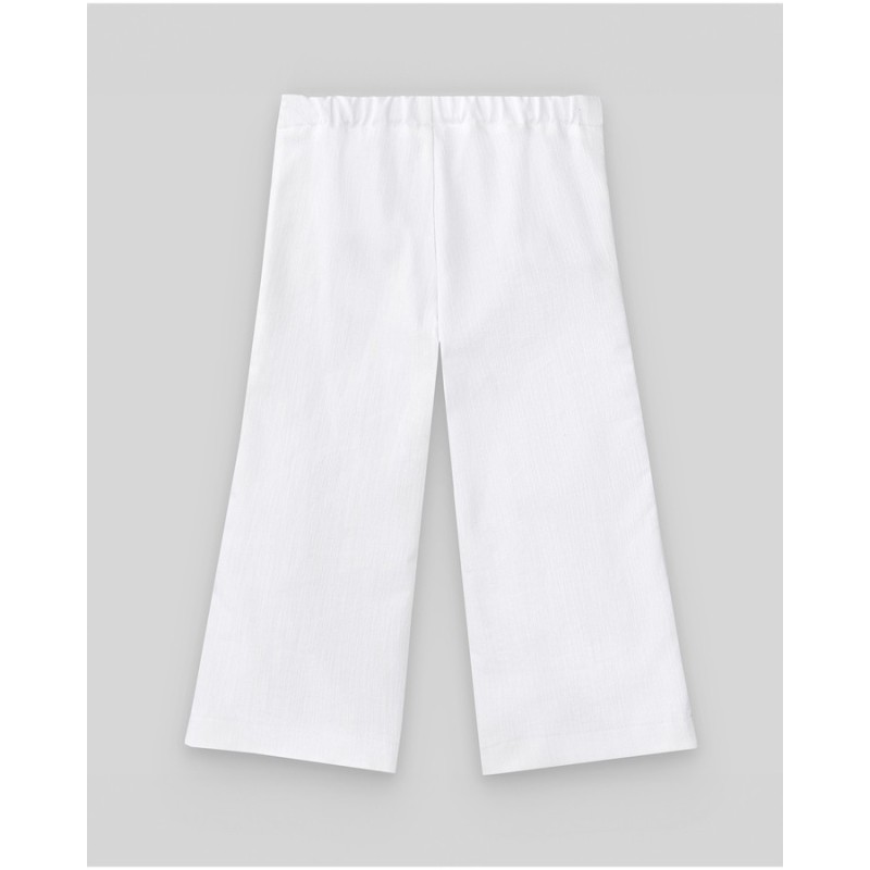 Pantalón largo blanco pata ancha  Colección primavera-verano 2025 de la marca española Paz Rodríguez