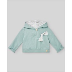 Sudadera niña felpa verde agua con gorro y lazo adorno.  Colección primavera-verano 2025 de la marca española Paz Rodriguez