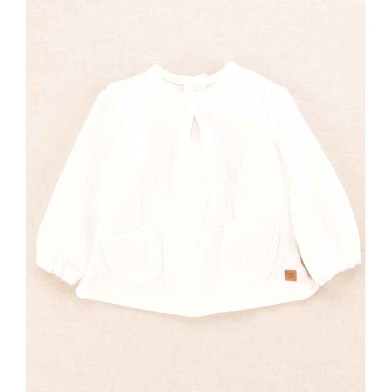 Blusa lisa bebe crudo bolsillos